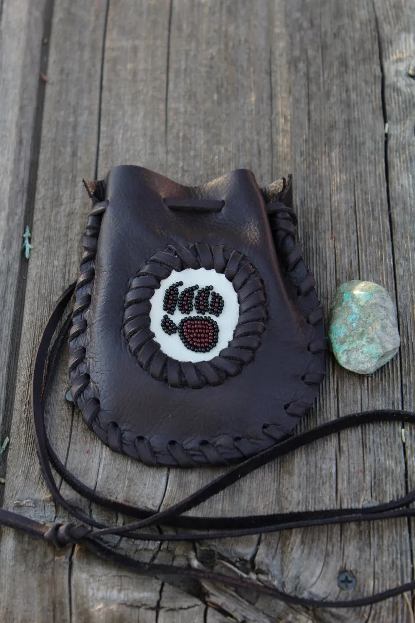 Leather medicine bag, beaded bear paw bag